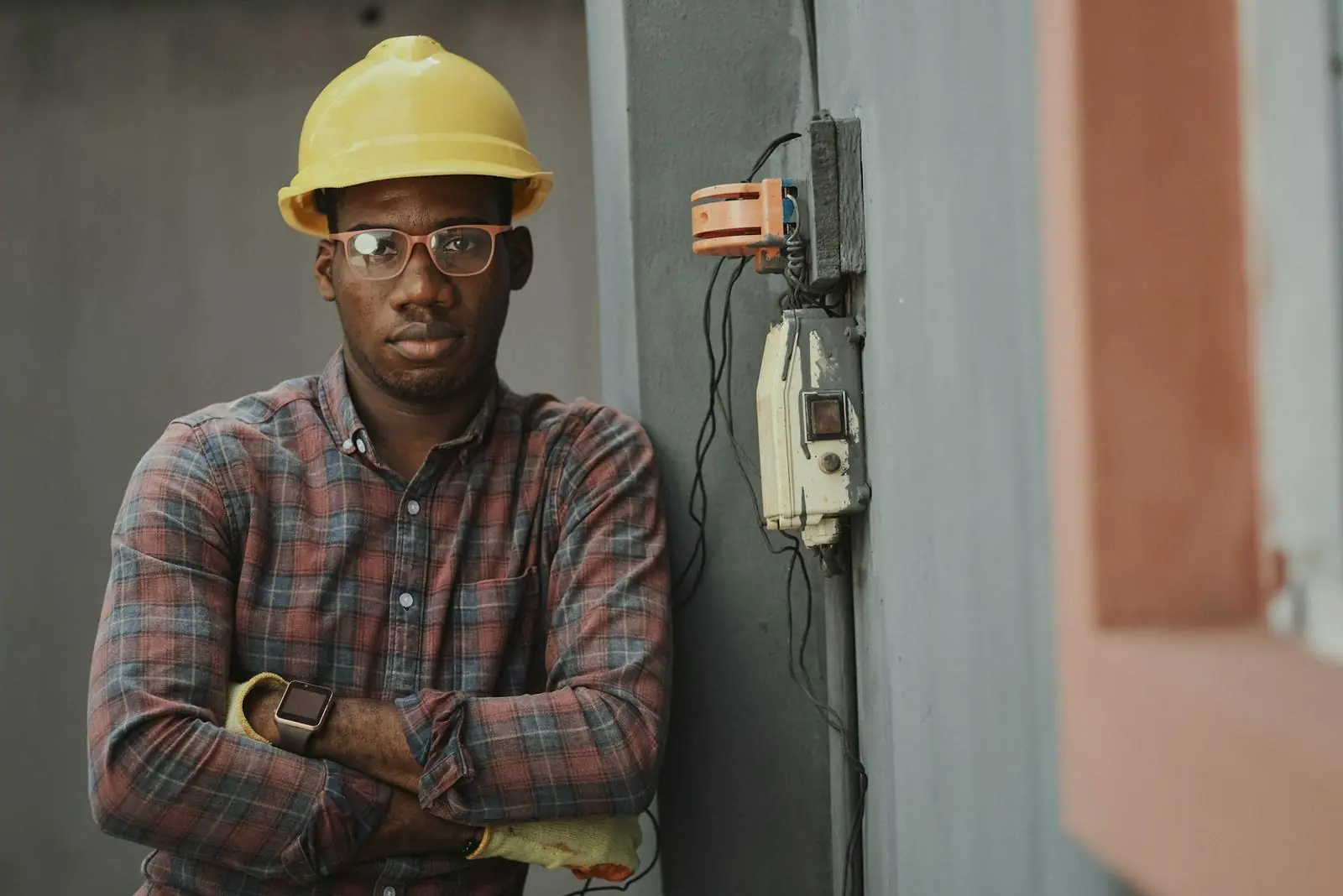 Field engineer in a hard hat on site
