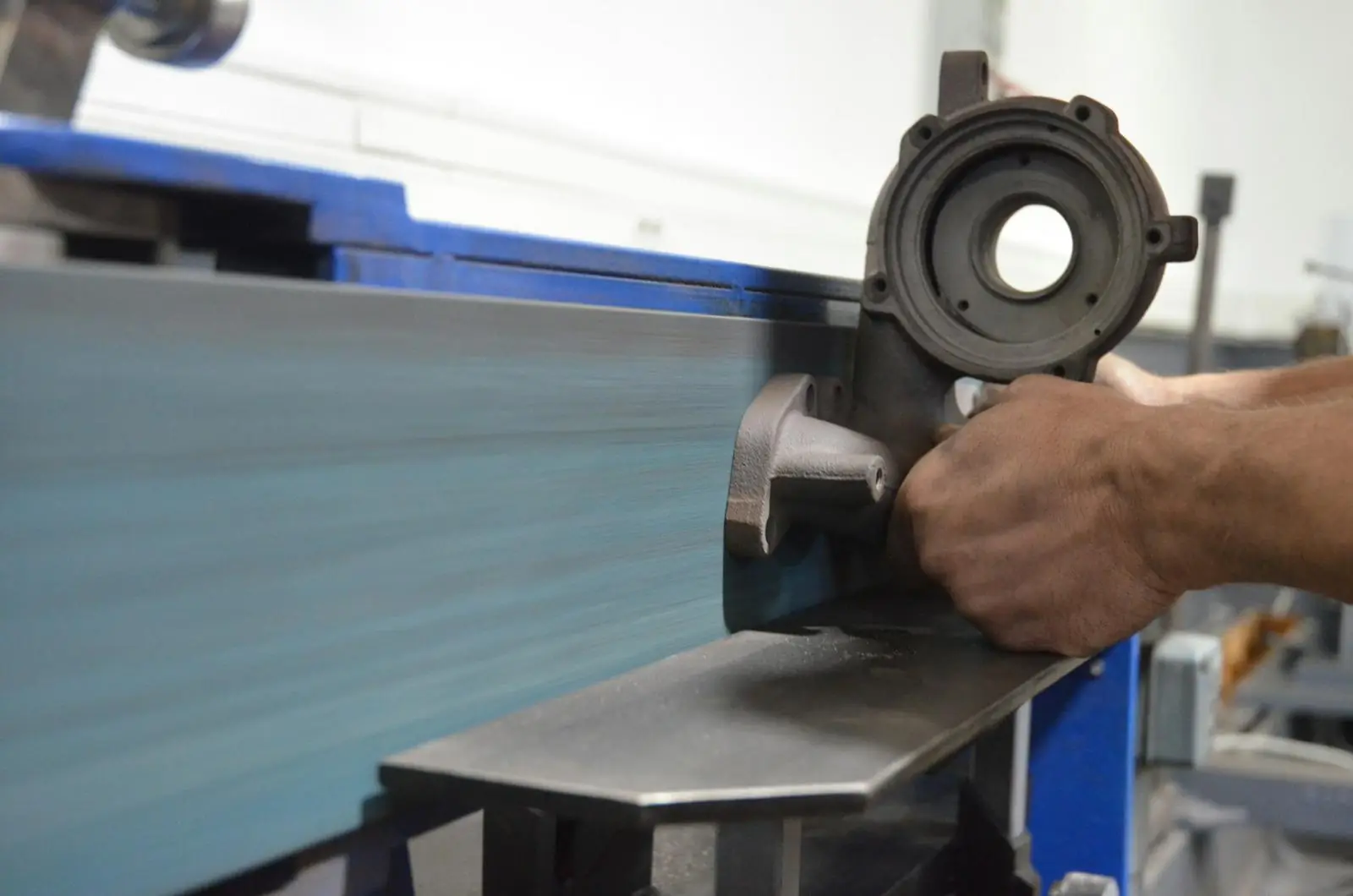 Fitting a machined part by hand